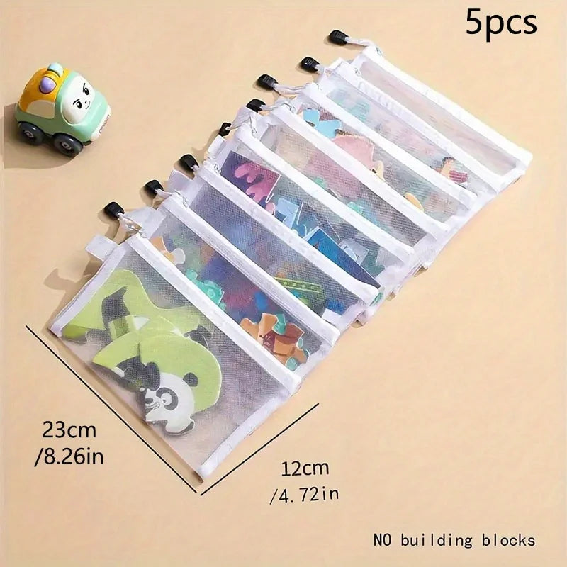Set of five mesh bags with building blocks on a beige background, showing dimensions and product name.