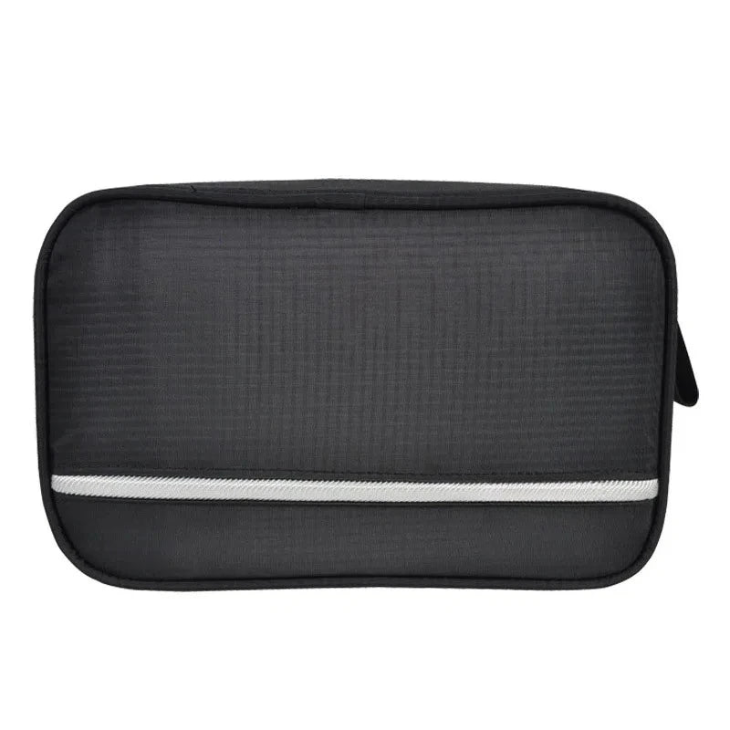 Black toiletry bag with a white stripe on a white background