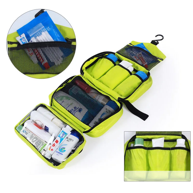 Green hanging travel toiletry bag open showing compartments and contents on a white background.