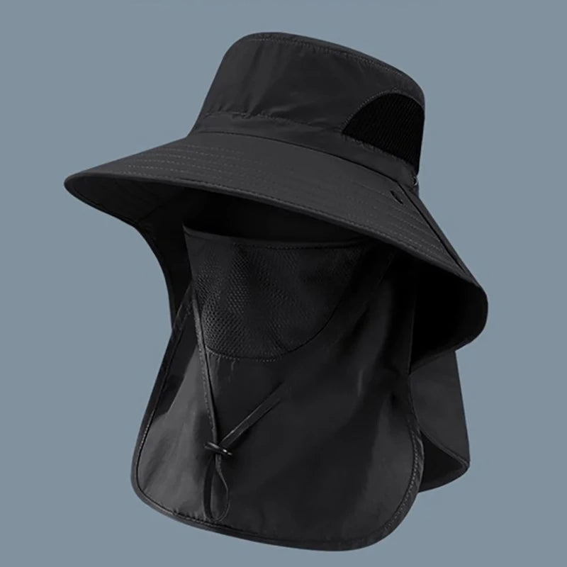 Black sun hat with neck flap on a gray background