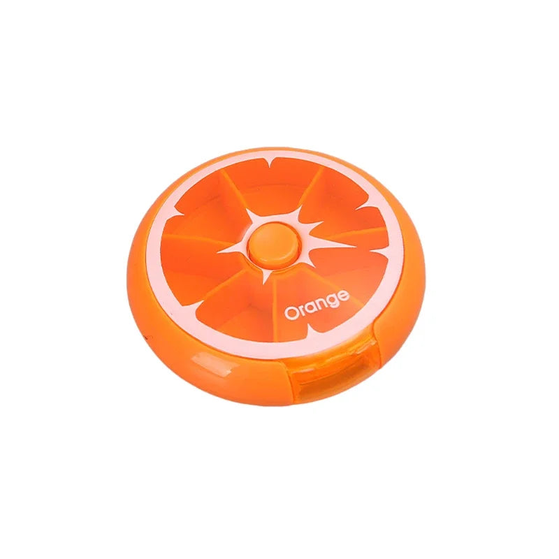 An orange citrus-themed circular organizer or container with a segmented top design and the word 'Orange' printed on the front, shown on a plain white background.