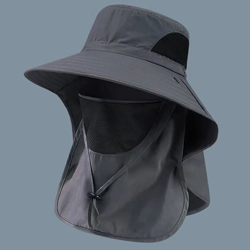 Gray sun hat with face covering on a gray background