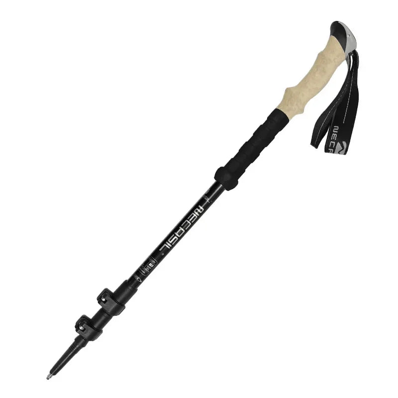 Black hiking pole with beige handle on a white background
