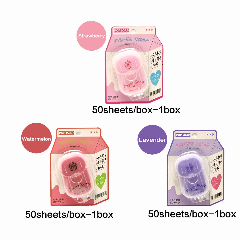 Three packages of Pop Soap with strawberry, watermelon, and lavender scents on a white background.