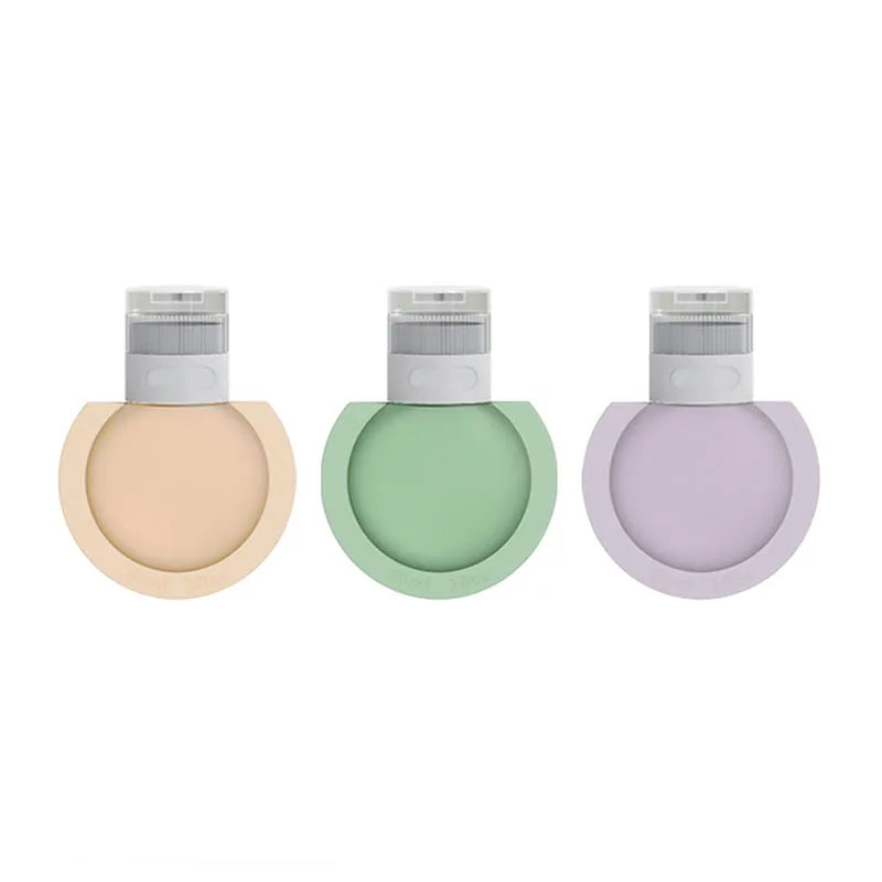 Three reusable silicone pet poop bags in peach, mint green, and light purple, arranged side by side on a solid white background.