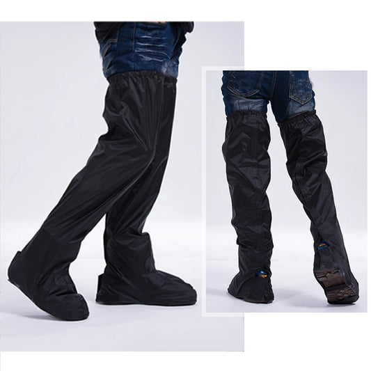Black leg and foot covers over jeans on a white background