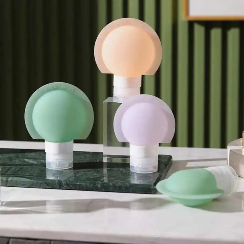 Colorful lampshades on a marble surface with a green curtain background