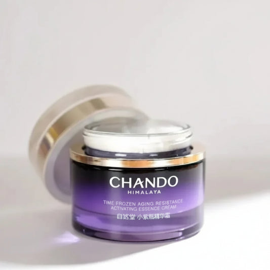 CHANDO Himalaya Time Frozen Aging Resistance Activating Essence Cream jar in purple with a gold band and clear cap, shown on a light background with Chinese promotional text overlay.
