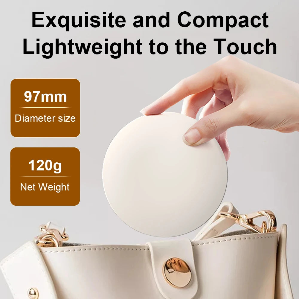 A hand holds a round, compact, off-white cosmetic mirror or compact case above a cream-colored handbag. The image includes text overlays stating 'Exquisite and Compact Lightweight to the Touch', '97mm Diameter size', and '120g Net Weight'.