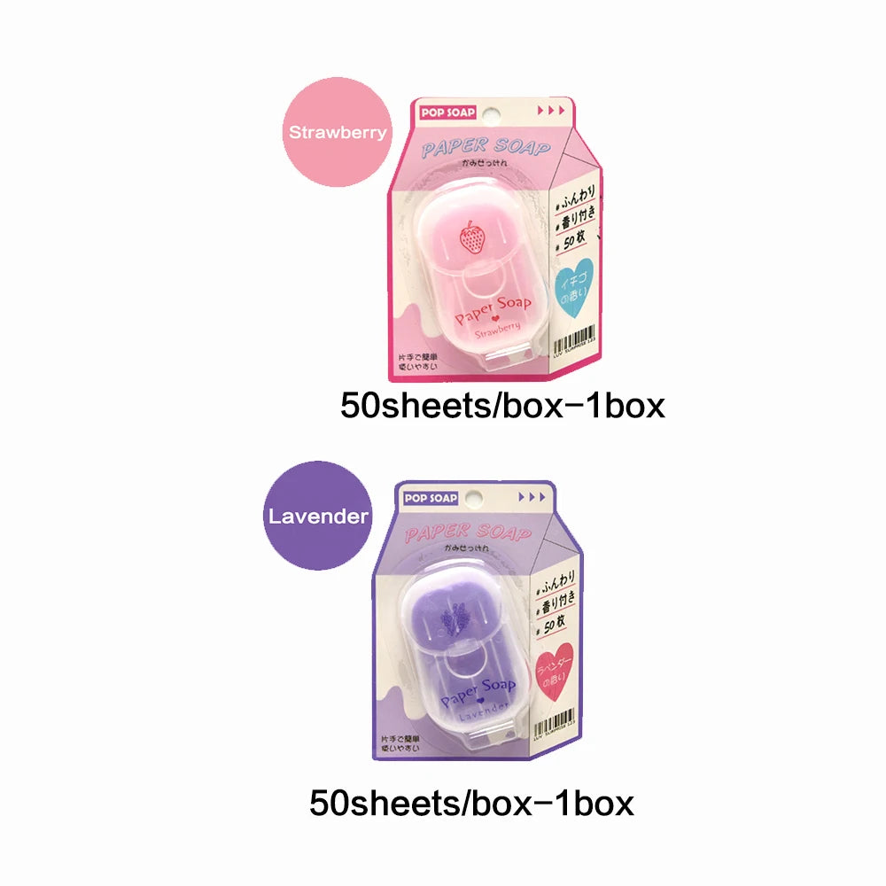 Two packages of paper soap with strawberry and lavender scents on a white background