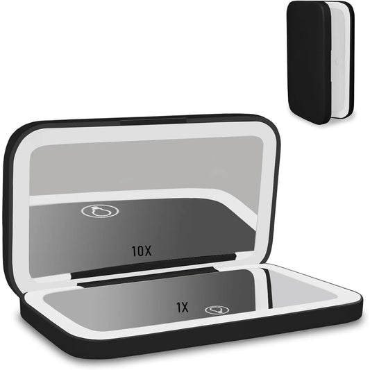 A black and white electronic cigarette case shown open, with a smaller inset image in the top right showing the case closed. The open case has a mirror on the inside lid with text indicating 10X and 1X, on a plain white background.