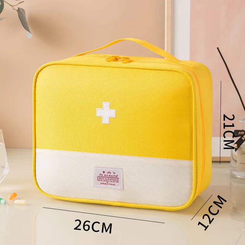 Yellow first aid kit with dimensions on a light background
