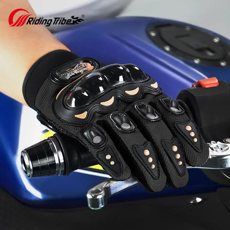 Black motorcycle glove with metallic accents on a blue motorcycle, featuring the 'Riding Tribe' brand.