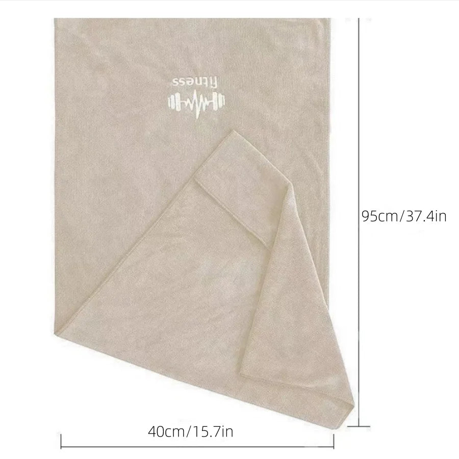 Beige towel with text and measurements on a white background