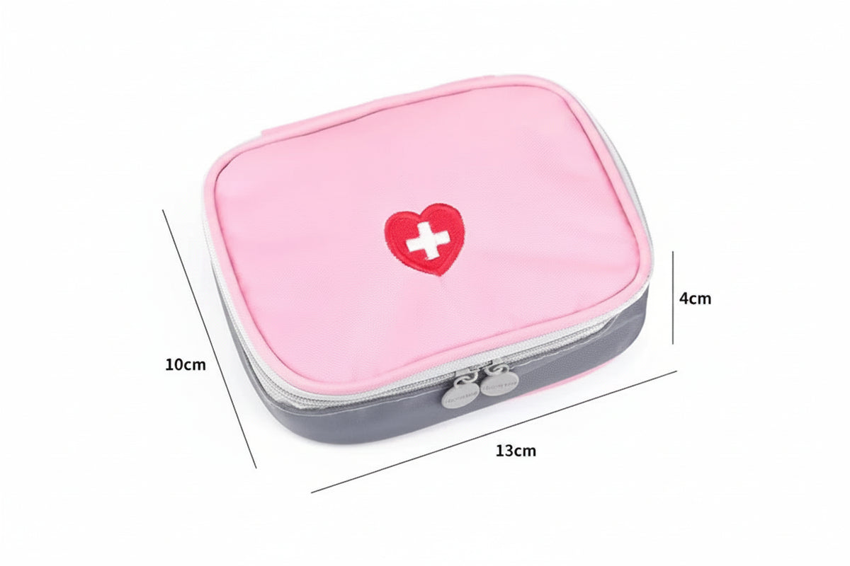 Pink first aid kit with a heart and cross symbol on a white background