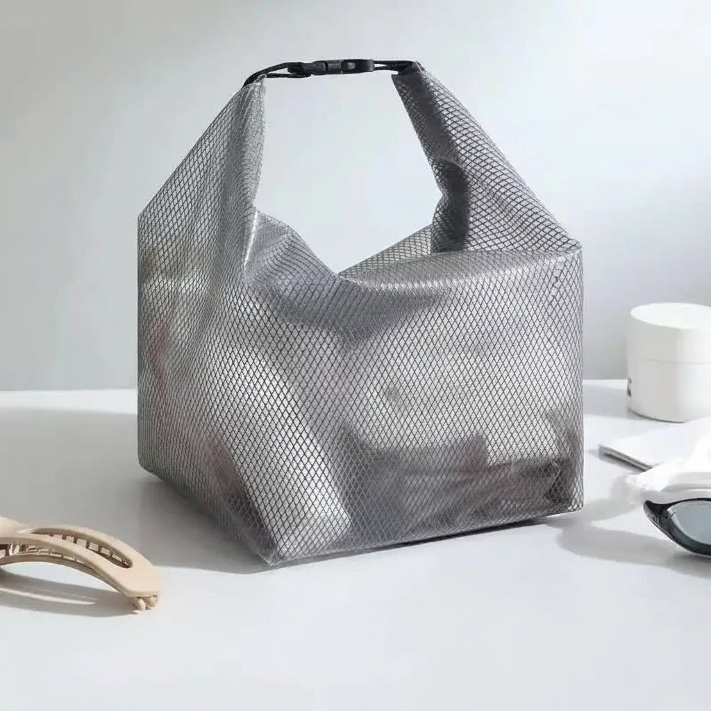 Gray mesh storage bag with a top handle, shown on a light gray surface with a black label reading 'Gray, L' and 'Size: 35*15.5*27.