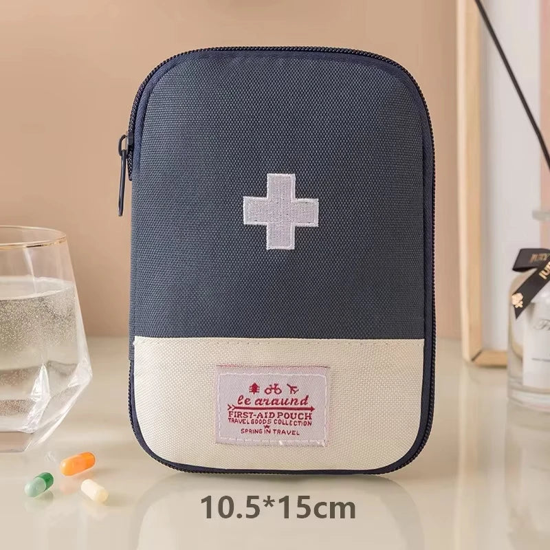 First aid kit with a cross symbol on a beige background