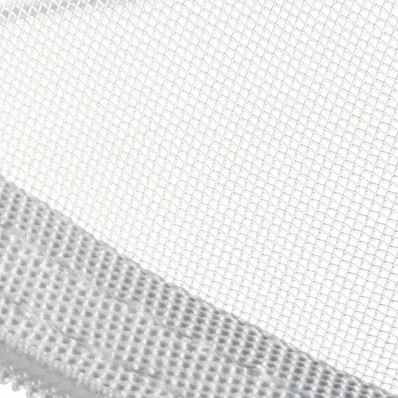 Close-up of a textured white surface with a grid pattern