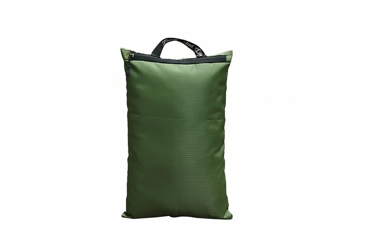 An olive green waterproof stuff sack with a black zipper and top handle, featuring a white printed airplane logo and the text 'Escape a miserable life - CROW Hideout' on the front, set against a plain white background.