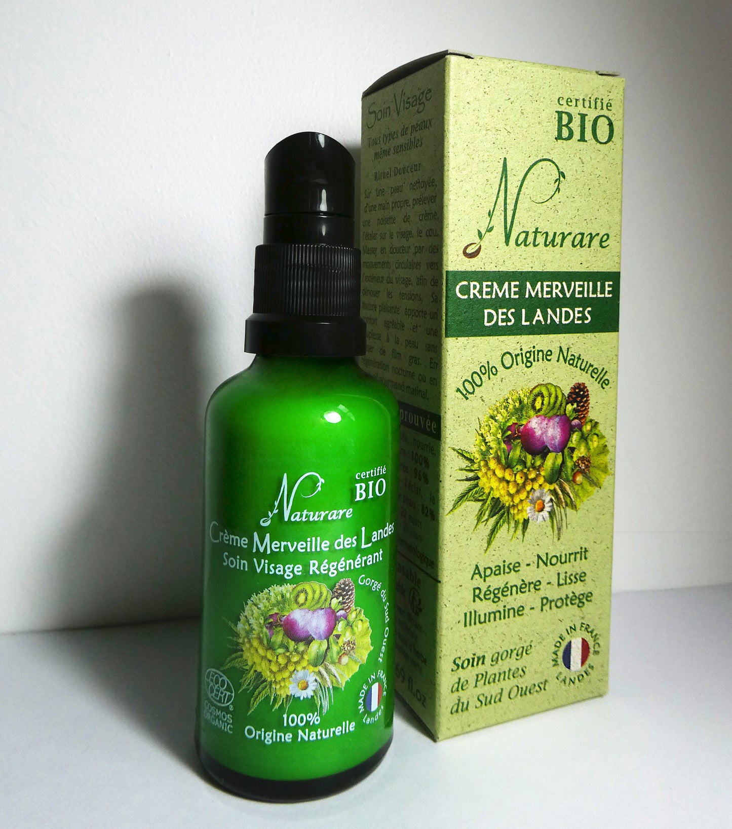 Green bottle and box of Naturare crème merveille des landes on a white background
