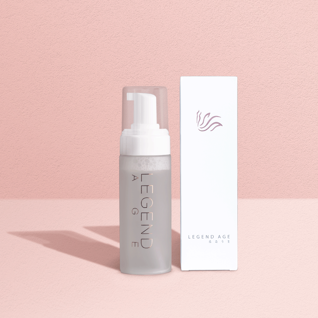Skincare bottle and packaging with 'Legend Age' branding on a pink background
